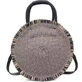 Round hand and shoulder bag