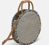Round hand and shoulder bag